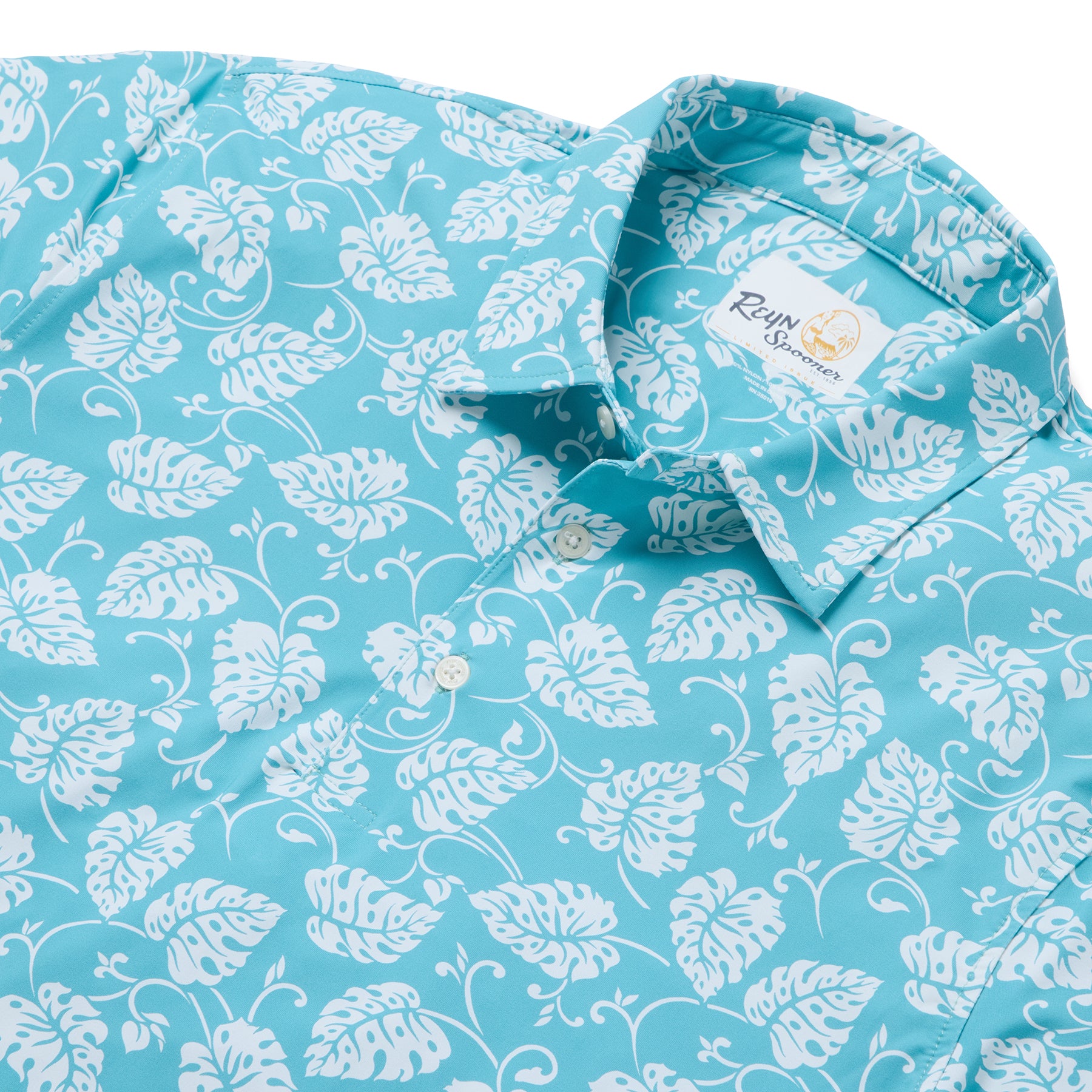 Reyn Spooner MONSTERA SWIRL PERFORMANCE POLO in AQUA